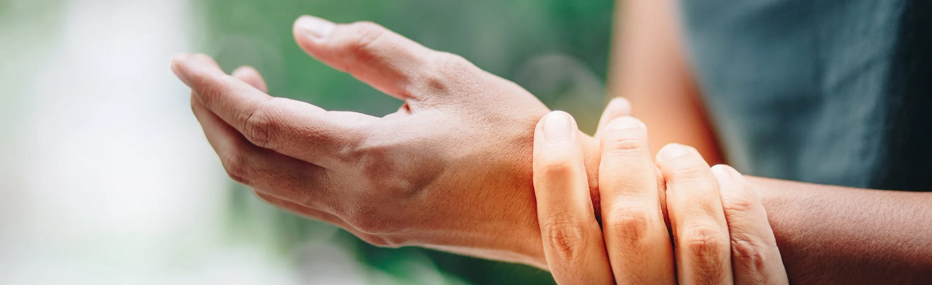 Arthritis of the small joints hand Holding wrist in pain due to arthritis of small joints