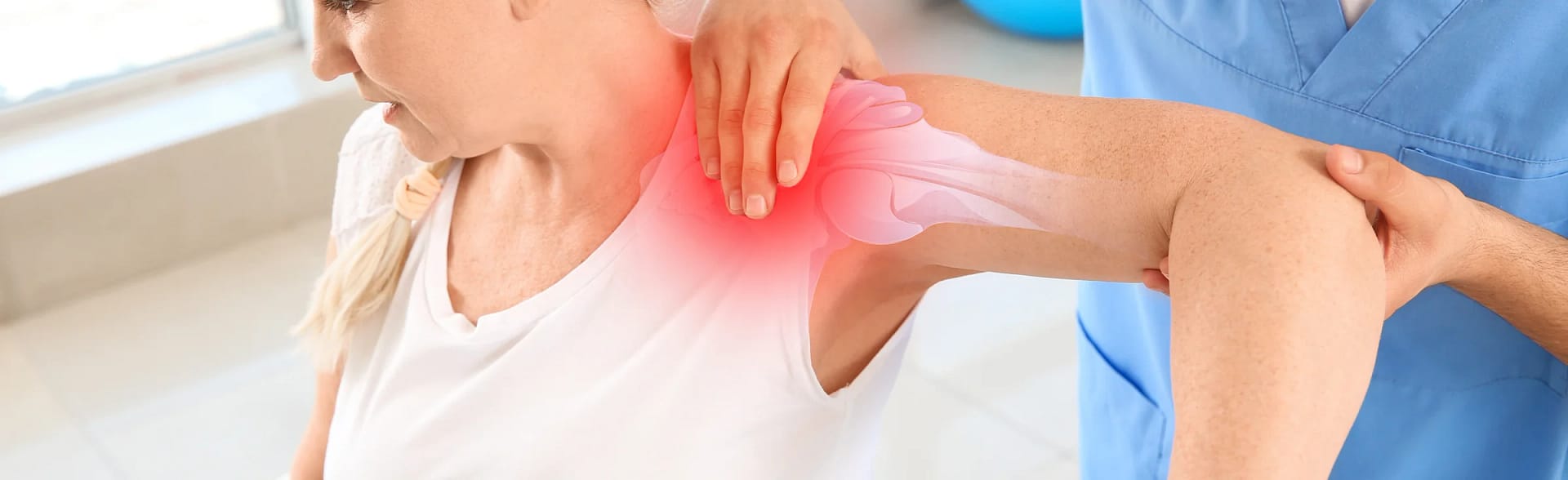Woman havig physiotherapy on her shoulder due to rotator cuff tear